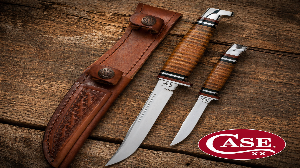 Two knives with leather sheathes on a wooden surface, featuring the Case brand logo.
